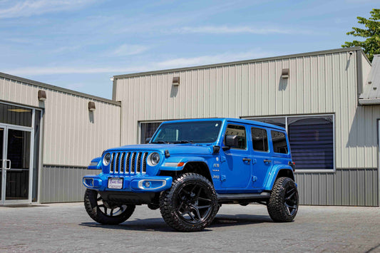 2023 Jeep Wrangler Sahara 4XE with a 2.5" Rough Country lift kit, 22x12 Fuel Flux wheels, and 35" Fury Country Hunter R/T tires.