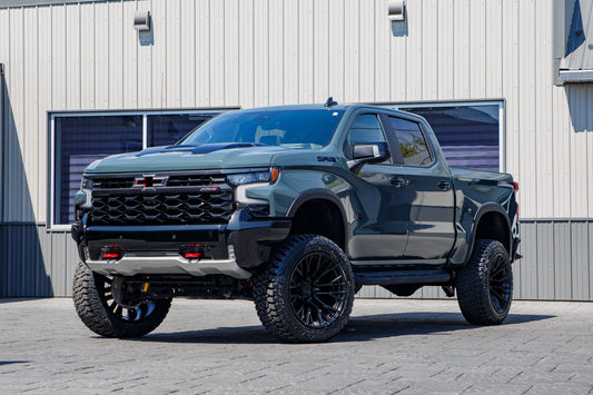 2026 Chevrolet Silverado 1500 ZR2 with a 4" ReadyLift lift kit, 22x12 Fuel Rebar wheels, and 35" Fury Country Hunter R/T tires.