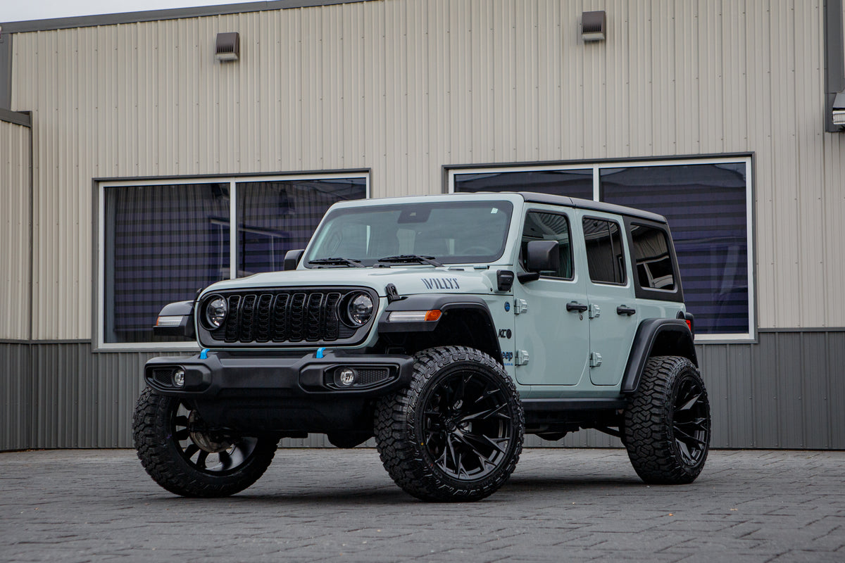 2024 Jeep Wrangler Willys 4XE with a 2.5" Rough Country lift kit, 22x12 Fuel Flame wheels, and 35" Fury Country Hunter R/T tires.