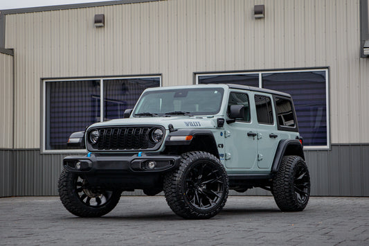 2024 Jeep Wrangler Willys 4XE with a 2.5" Rough Country lift kit, 22x12 Fuel Flame wheels, and 35" Fury Country Hunter R/T tires.