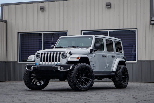 2023 Jeep Wrangler Sahara 4XE with a 2.5" Rough Country lift kit, 22x12 Fuel Flame wheels, and 35" Fury Country Hunter R/T tires.