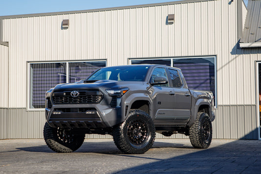 2025 Toyota Tacoma TRD Off-Road with a 3" ReadyLift lift kit, 18x9 Fuel Revolt wheels, and 35" Avix Trailtek R/T tires.