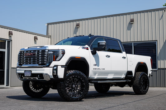 2024 GMC Sierra 2500 Denali with a BDS 5" Lift Kit, 22x12 TIS 565BM wheels, and 37" Nitto Ridge Grappler tires.