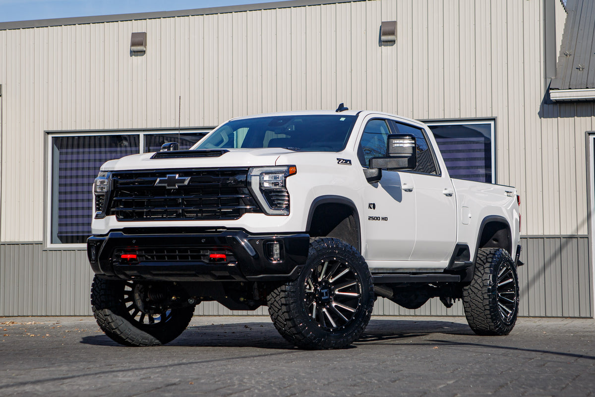 2025 Chevrolet Silverado 2500 LT with a 5" BDS lift kit, 22x12 Hostile H123 wheels, and 37" Nitto Ridge Grappler tires.