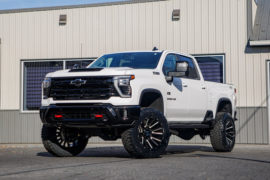 2025 Chevrolet Silverado 2500 LT with a 5" BDS lift kit, 22x12 Hostile H123 wheels, and 37" Nitto Ridge Grappler tires.