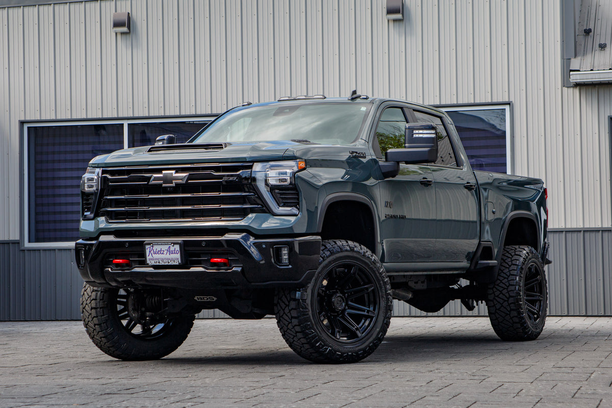 2026 Chevrolet Silverado 2500 LT with a 5" BDS lift kit, 22x12 Fuel Brawl wheels, and 37" Nitto Ridge Grappler tires.