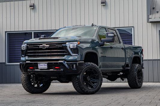 2026 Chevrolet Silverado 2500 LT with a 5" BDS lift kit, 22x12 Fuel Brawl wheels, and 37" Nitto Ridge Grappler tires.