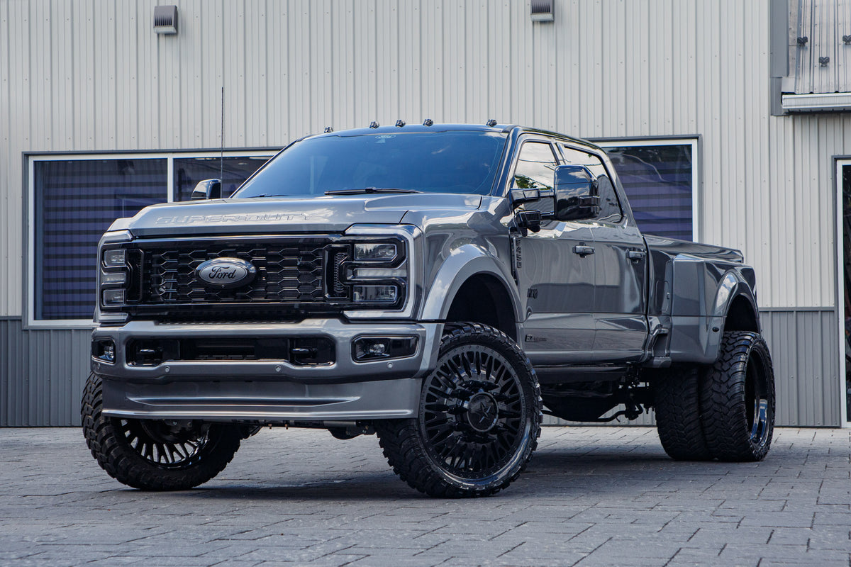 2026 Ford F-450 Super Duty Platinum with a 4" Wicked lift kit, 26x8.25 American Force Business wheels, and 37" AMP Terrain Attack M/T A tires.