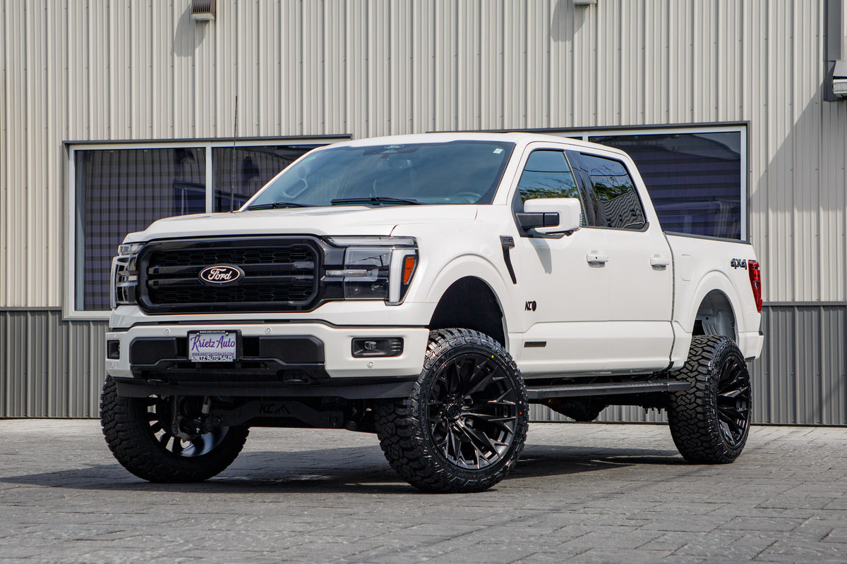 2025 Ford F-150 Lariat with a 6" Rough Country lift kit, 22x12 Fuel Flame wheels, and 35" Fury Country Hunter R/T tires.