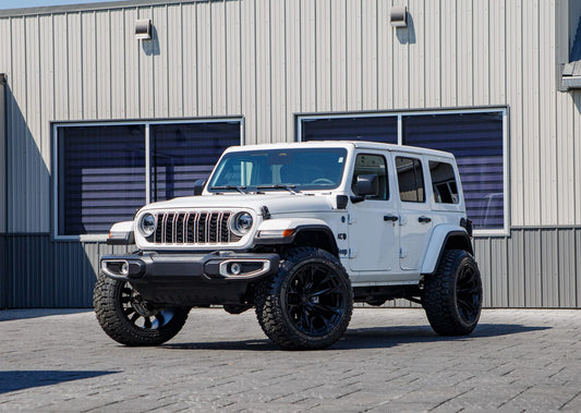 2025 Jeep Wrangler Sahara 4XE with a 2.5" Rough Country lift kit, 22x12 Fuel Flame wheels, and 35" Fury Country Hunter R/T tires.