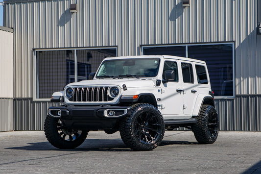 2025 Jeep Wrangler Sahara 4XE with a 2.5" Rough Country lift kit, 22x12 Fuel Flame wheels, and 35" Fury Country Hunter R/T tires.