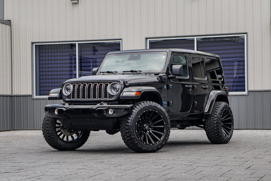 2025 Jeep Wrangler Sahara 4XE with a 2.5" Rough Country lift kit, 22x12 Hostile H123 wheels, and 35" Fury Country Hunter R/T tires.