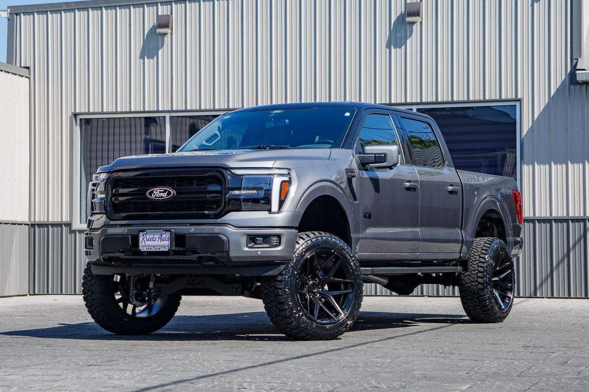 2025 Ford F-150 Lariat with a 6" Rough Country lift kit, 22x12 Fuel Flux wheels, and 35" Fury Country Hunter R/T tires.
