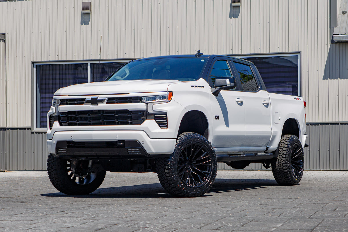 2026 Chevrolet Silverado 1500 RST with a 6" Rough Country lift kit, 22x12 Fuel Rebar wheels, and 35" Fury Country Hunter R/T tires.