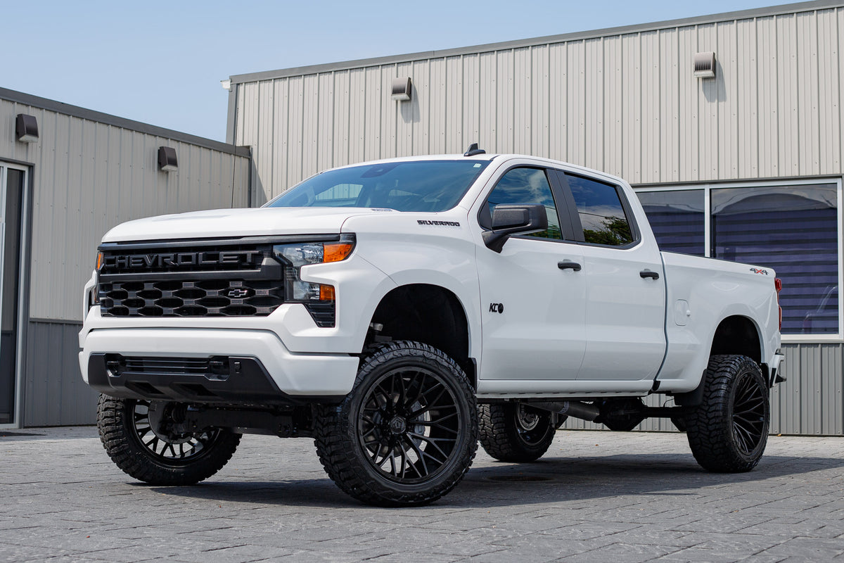2024 Chevrolet Silverado 1500 Custom with a 6" Rough Country lift kit, 22x12 TIS 566B, and 35" Avix Trailtek R/T tires.