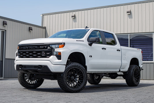 2024 Chevrolet Silverado 1500 Custom with a 6" Rough Country lift kit, 22x12 TIS 566B, and 35" Avix Trailtek R/T tires.