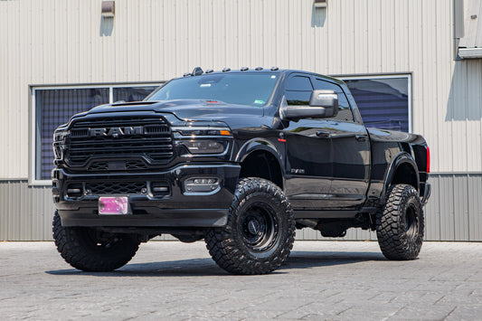 2025 Ram 2500 Laramie with a 4" BDS lift kit, 17x10 Vision Wheel 403 Tactical wheels, and 37" Toyo Open Country R/T Pro tires.