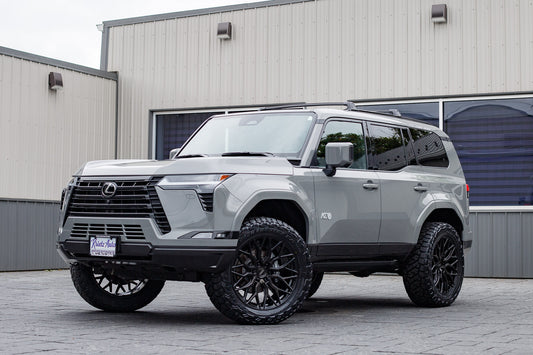 2024 Lexus GX550 Luxury with a 2.5" Readylift lift kit, 22x9.5 Vossen HF63 wheels, and 285/55 Toyo Open Country R/T Trail tires.