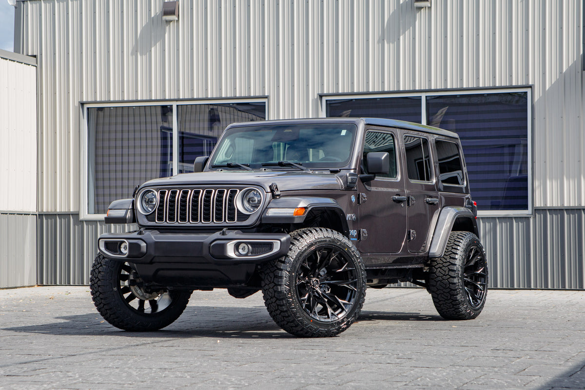 2025 Jeep Wrangler Sahara 4XE with a 2.5" Rough Country lift kit, 22x12 Fuel Flame wheels, and 35" Fury Country Hunter R/T tires.
