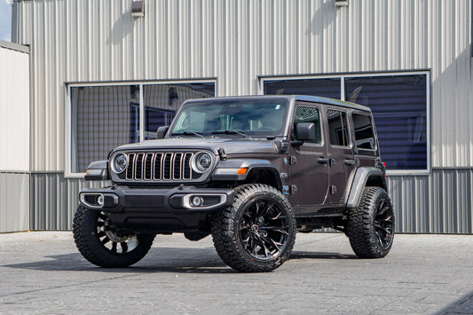 2025 Jeep Wrangler Sahara 4XE with a 2.5" Rough Country lift kit, 22x12 Fuel Flame wheels, and 35" Fury Country Hunter R/T tires.