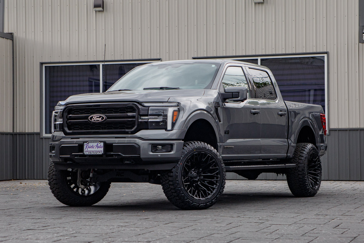2025 Ford F-150 Lariat with a 6" Rough Country lift kit, 22x12 Fuel Strike wheels, and 35" Fury Country Hunter R/T tires.