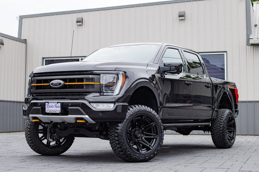 2023 Ford F-150 Tremor with a 6" Rough Country lift kit, 22x12 Fuel Brawl wheels and 35" Fury Country Hunter tires.
