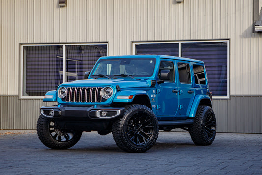 2024 Jeep Wrangler Sahara 4XE with a 2.5" Rough Country lift kit, 22x12 Fuel Rebar wheels, and 35" Fury Country Hunter R/T tires.