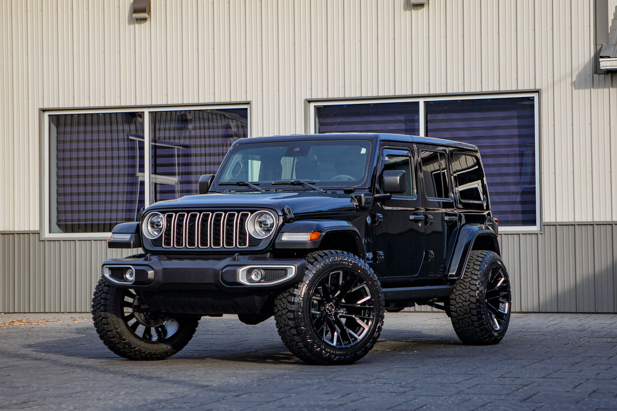2025 Jeep Wrangler Sahara 4XE with a 2.5" Rough Country lift kit, 22x12 Fuel Rebar wheels, and 35" Fury Country Hunter R/T tires.