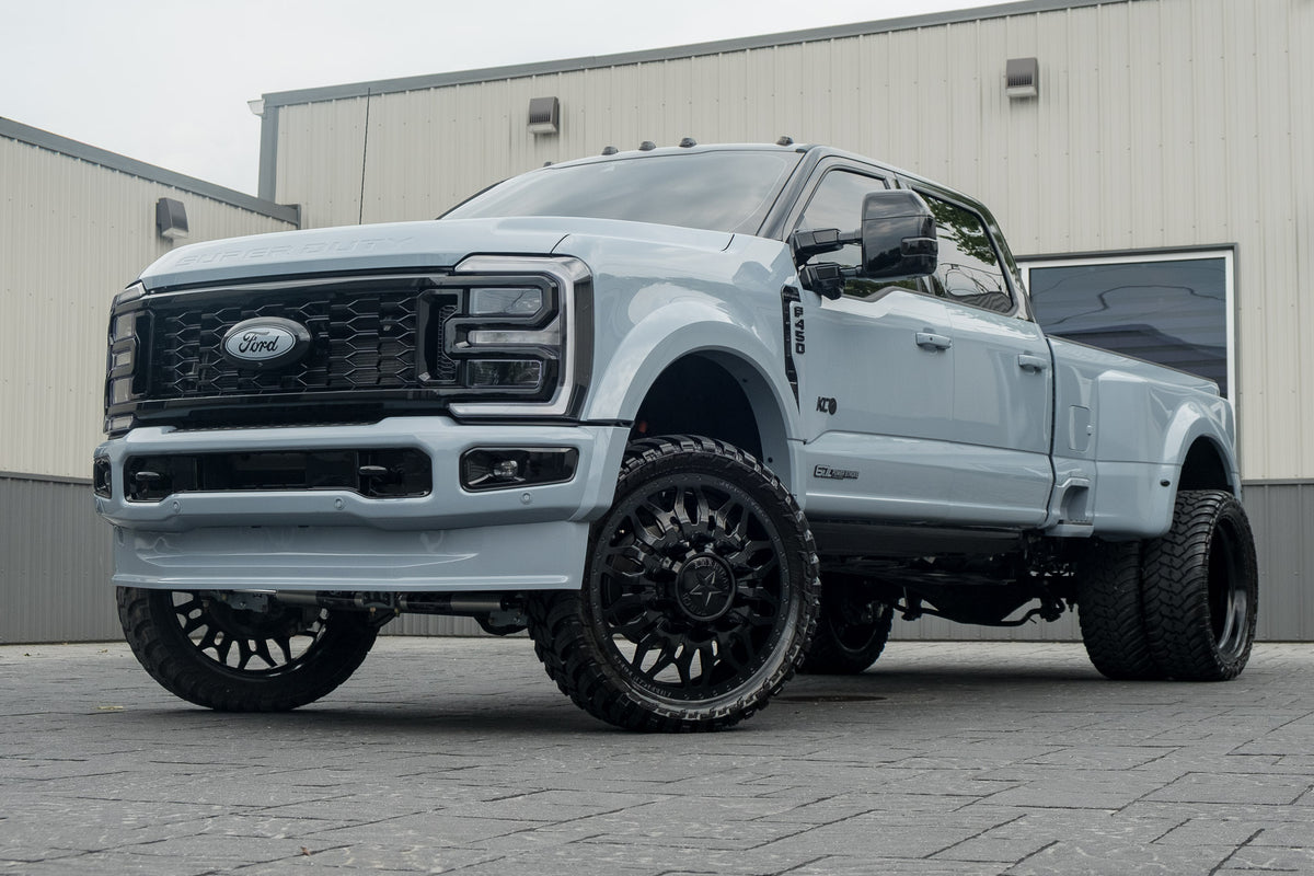 2026 Ford F-450 Super Duty Platinum with a 4" Wicked lift kit, 26x8.25 American Force Shrapnel wheels, and 37" AMP Terrain Attack M/T A tires.