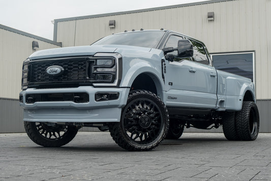 2026 Ford F-450 Super Duty Platinum with a 4" Wicked lift kit, 26x8.25 American Force Shrapnel wheels, and 37" AMP Terrain Attack M/T A tires.