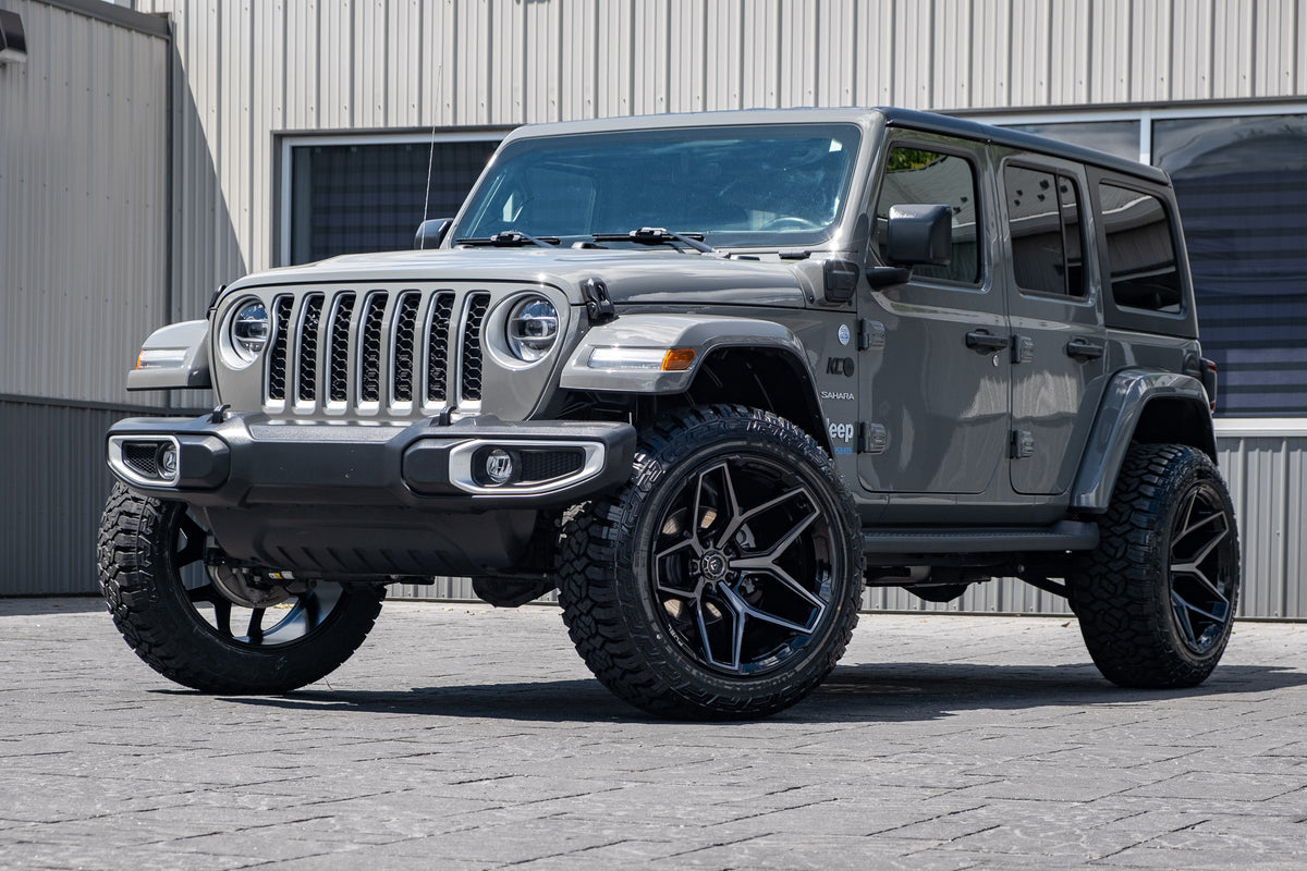 2021 Jeep Wrangler Unliited Sahara 4xe Gray with 2.5 inch rough country lift kit 22x12 Fuel Flux Wheels and 35 inch Fury Country Hunter R/T Tires
