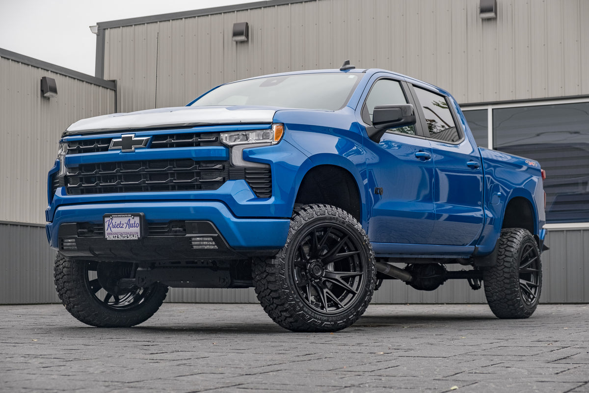 2023 Chevrolet Silverado 1500 RST with a 6" Rough Country lift kit, 22x12 Fuel Catalyst wheels, and 35" Fury Country Hunter R/T tires.