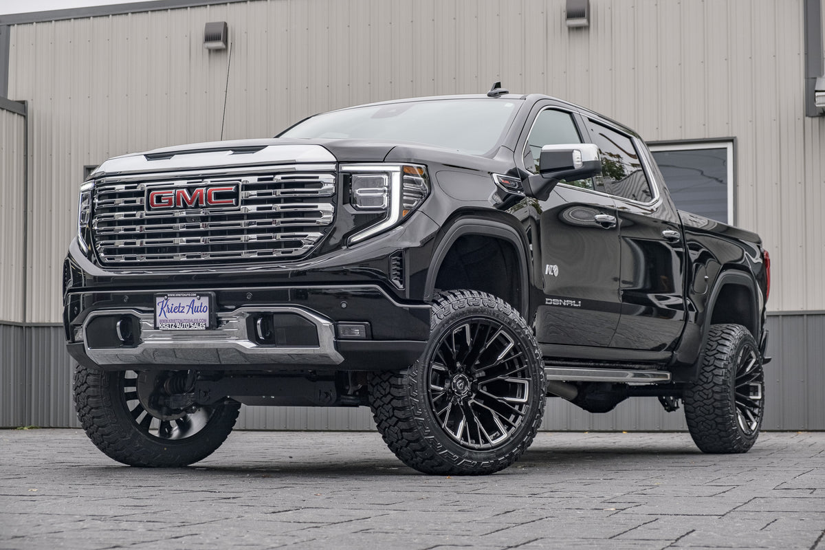 2024 GMC Sierra 1500 Denali with a 6" Rough Country suspension kit, 22x12 Fuel Rebar wheels, and 35" Fury Country Hunter R/T tires.
