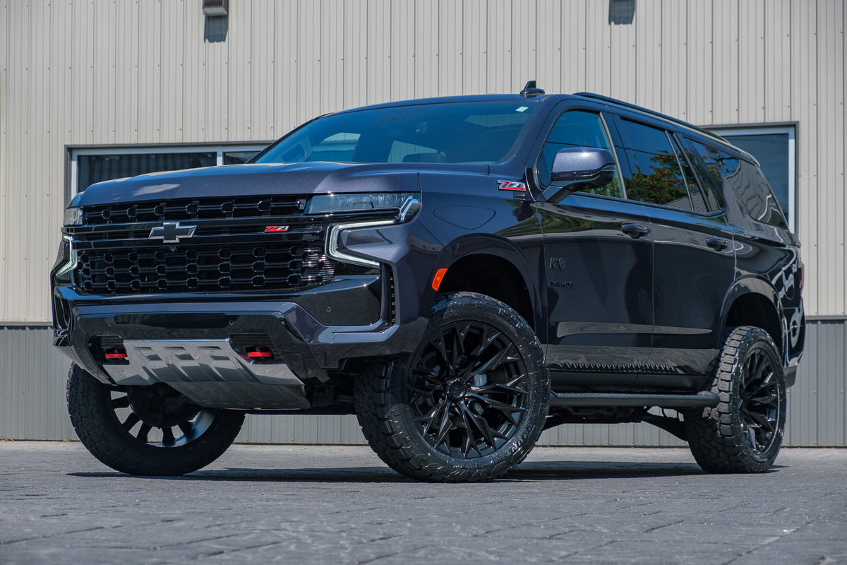 2023 Chevrolet Tahoe Z71 with a 3" ReadyLift lift kit, 22x10 Fuel Flame wheels, and 295/50 Toyo Open Country AT3