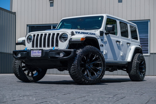 2021 Jeep Wrangler Unlimited Rubicon 4XE with Jeep Stock suspension, 22x12 Fuel Flame wheels, and 35" Fury Country Hunter R/T tires.