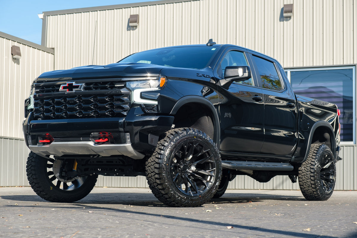 2023 Chevrolet Silverado 1500 ZR2 with a 4" ReadyLift lift kit, 22x12 Fuel Flame wheels, and 35" Fury Country Hunter R/T tires.