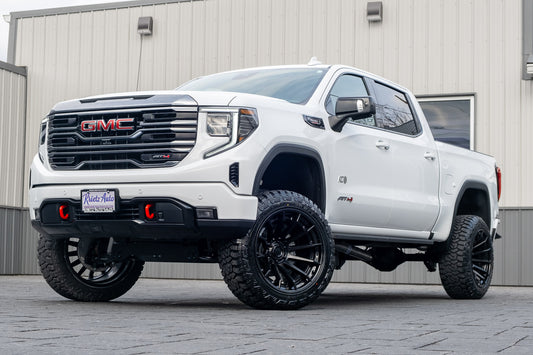 2024 GMC Sierra 1500 AT4 with a 6" Rough Country lift kit, 22x12 Fuel Burn wheels, and 35" Fury Country Hunter R/T tires.
