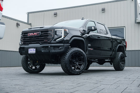 2024 GMC Sierra 1500 AT4X with a 4" ReadyLift lift kit, 22x12 Fuel Brawl wheels, and 35" Fury Country Hunter R/T tires.
