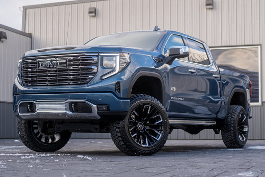 2024 GMC Sierra 1500 Denali Ultimate with a 6" Rough Country suspension kit, 22x12 Fuel Rebar wheels, and 35" Fury Country Hunter R/T tires.