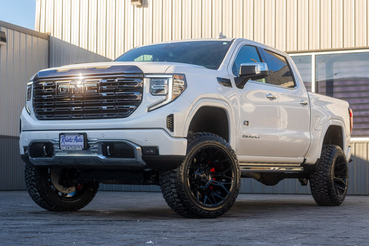 2024 GMC Sierra 1500 Denali Ultimate with a 6" Rough Country lift kit, 22x12 Fuel Twitch wheels, and 35" Fury Country Hunter R/T tires.