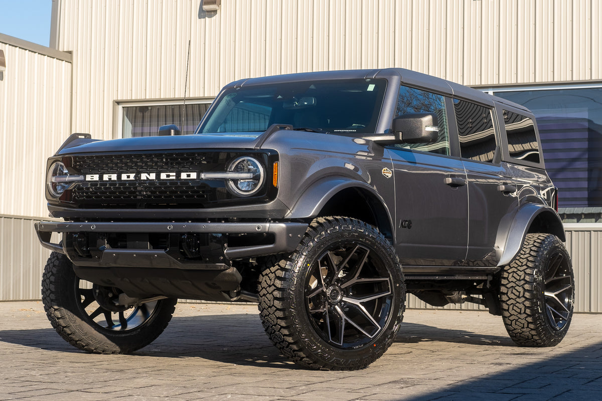 2024 Ford Bronco Wildtrak with a 2.25" Zone lift kit, 22x12 Fuel Flux wheels, and 35" Fury Country Hunter R/T tires.