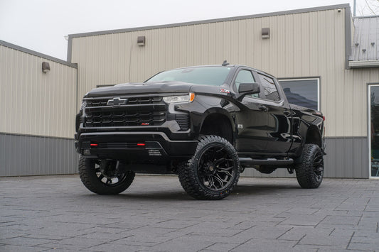 2024 Chevrolet Silverado 1500 LT Trail Boss with a 6" Rough Country lift kit, 22x12 4Play 4P83 wheels, and 35" Fury Country Hunter R/T tires.