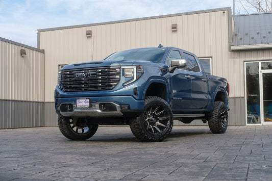 2024 GMC Sierra 1500 Denali Ultimate with a 6" Rough Country lift kit, 22x12 Fuel Super C wheels, and 35" Fury Country Hunter R/T tires.
