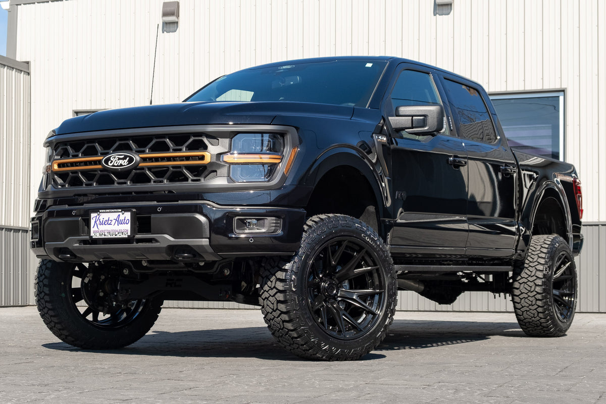 2024 Ford F-150 Tremor with a 6" Rough Country lift kit, 22x12 Fuel Catalyst wheels, and 35" Fury Country Hunter R/T tires.