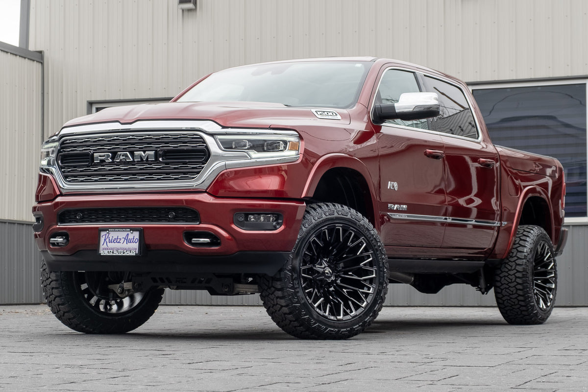 2023 Ram 1500 Limited with a 5" Rough Country lift kit, 22x12 Fuel Strike wheels, and 35" Fury Country Hunter R/T tires.