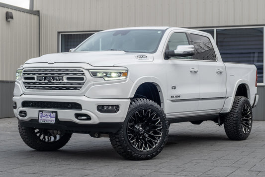 2023 Ram 1500 Limited with a 5" Rough Country lift kit, 22x12 Fuel Strike wheels, and 35" Fury Country Hunter R/T tires.