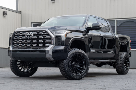 2024 Toyota Tundra Platinum with a 6" Rough Country lift kit, 22x12 Fuel Burn wheels, and 35" Fury Country Hunter R/T tires.