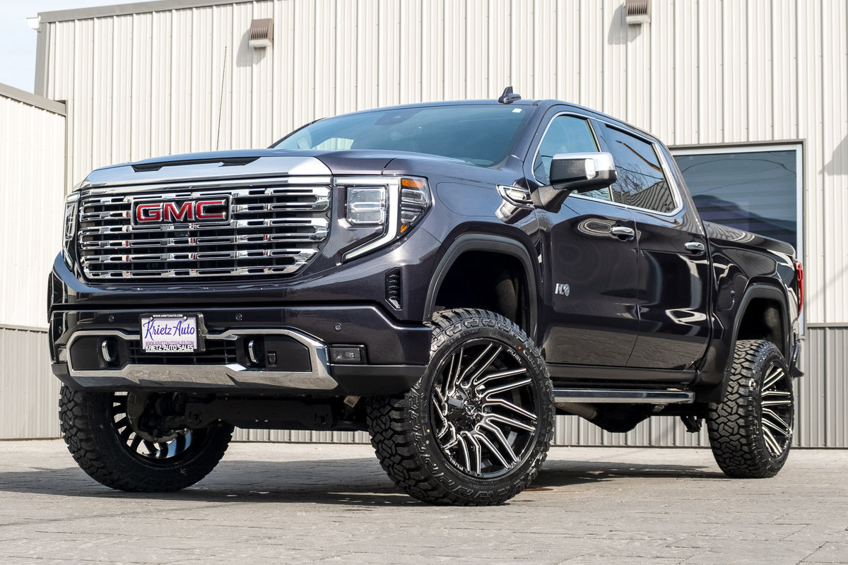 2024 GMC Sierra 1500 Denali with a 6" Rough Country lift kit, 22x12 Fuel Typhoon wheels, and 35" Fury Country Hunter R/T tires.