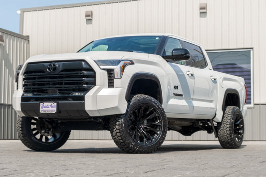 2024 Toyota Tundra Platinum with a 6" Rough Country lift kit, 22x12 Fuel Flame wheels, and 35" Fury Country Hunter R/T tires.