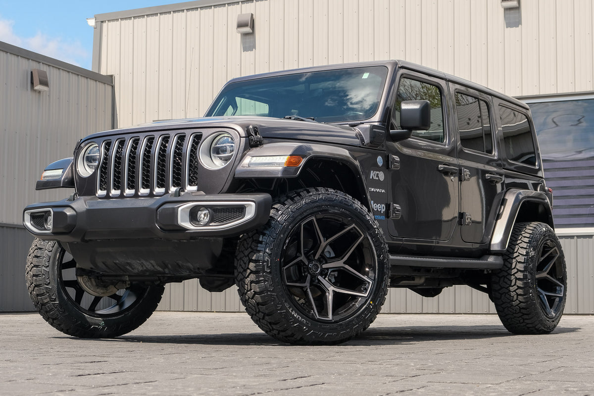 2021 Jeep Wrangler Unlimited Sahara 4XE with a 2.5" Rough Country lift kit, 22x12 Fuel Flux wheels, and 35" Fury Country Hunter R/T tires.